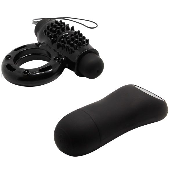 Telecomando Ring nero BAILE FOR HIM 20V, con design compatto e pulsanti, per dispositivi elettronici.