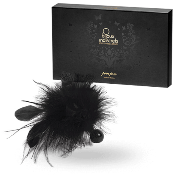 Spolverino in piuma Pom Pom di Bijoux Indiscrets, decorato con morbidi pom pom in piuma, accessorio elegante e delicato.