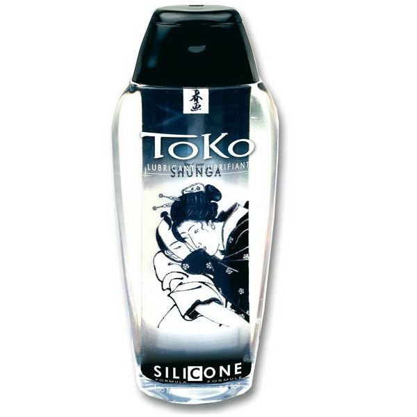 Lubrificante al silicone Shunga Toko, bottiglia con etichetta bianca e rosa, contenuto per uso intimo e massaggi.