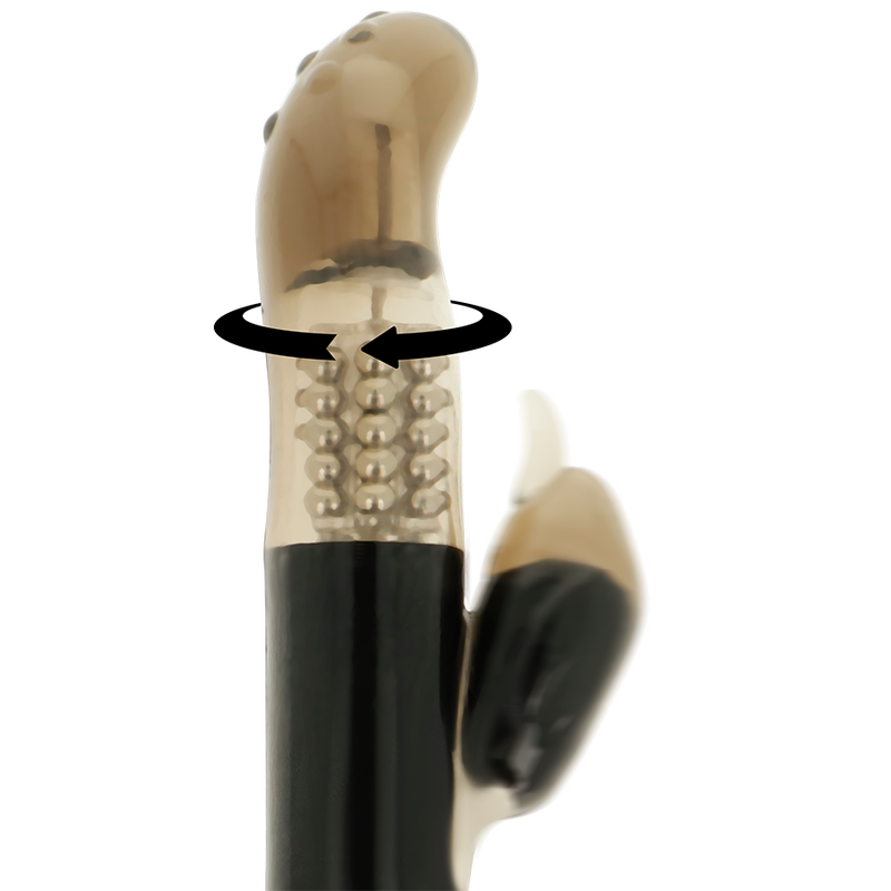Vibratore rotatore OHMAMA con stimolatore del clitoride a forma di delfino, dettagli ergonomici e superficie liscia.