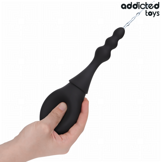 Detergente da viaggio modello 4 di ADDICTED TOYS, piccolo e compatto, con confezione pratica e design elegante.