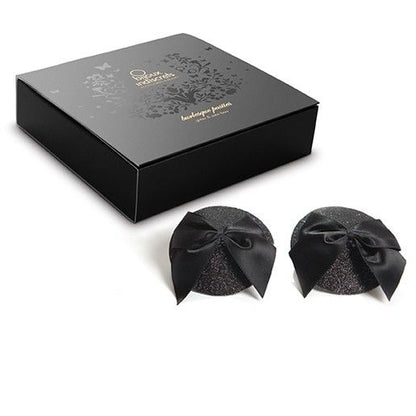 Pasties burlesque lucidi con fiocco della linea Bijoux Burlesque, copritezzoli eleganti e lucidi con dettaglio fiocco.