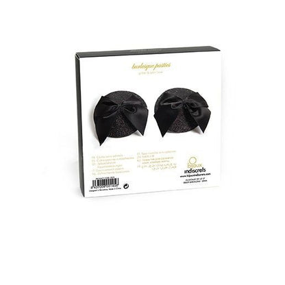 Pasties lucidi con fiocco della linea Bijoux Burlesque, copritezzoli burlesque eleganti e decorativi con fiocco brillante.