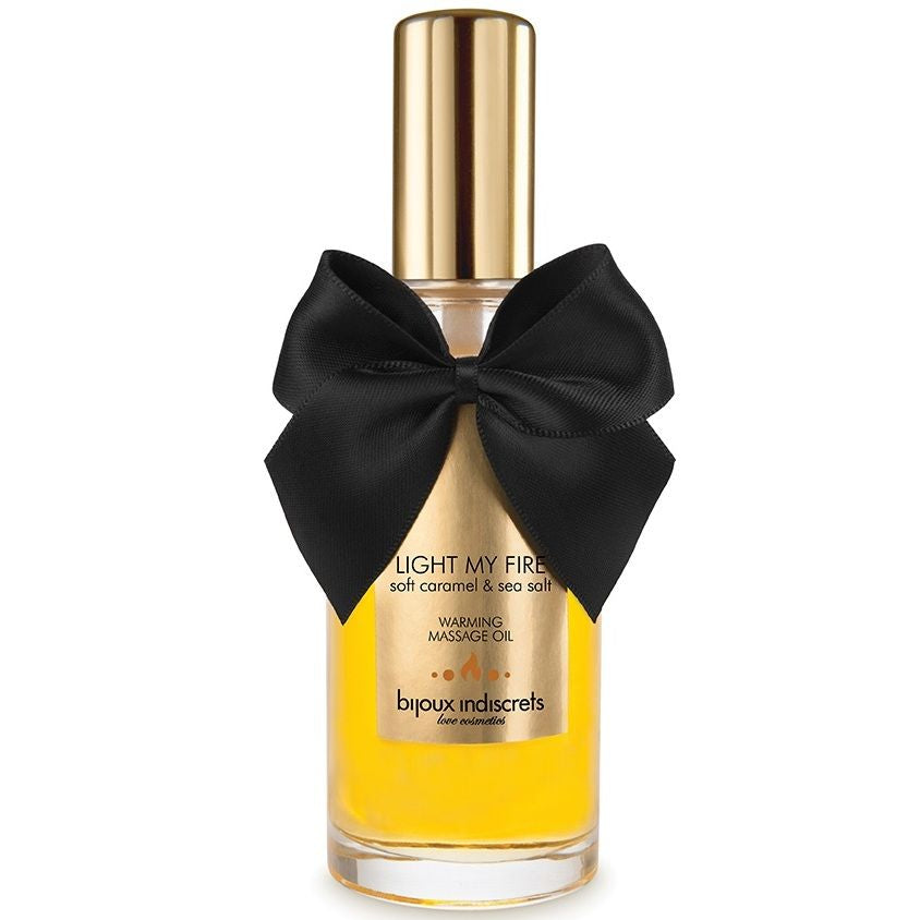 Olio da massaggio BIJOUX LOVE COSMETIQUES con effetto caldo e aroma al caramello, bottiglia con etichetta elegante