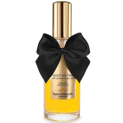 Olio da massaggio BIJOUX LOVE COSMETIQUES con effetto caldo e aroma al caramello, bottiglia con etichetta elegante