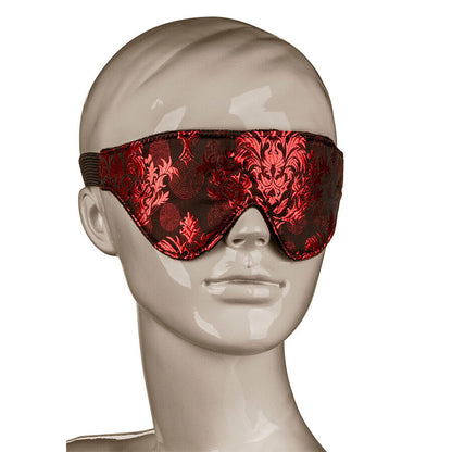 Maschera opaca per occhi CALEXOTICS Scandal con dettagli rossi, modello elegante e misterioso per giochi di ruolo e costume.