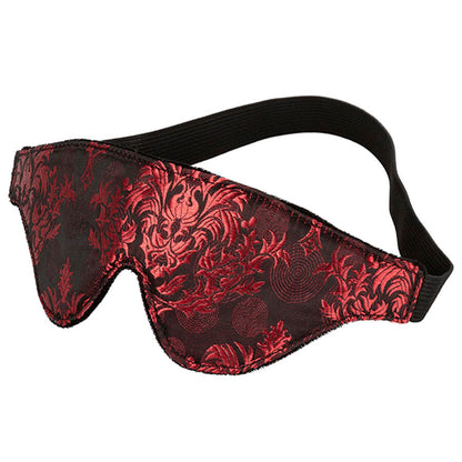 Maschera occhi opaca con dettagli rossi di CALEXOTICS, accessorio misterioso e seducente per giochi di ruolo.