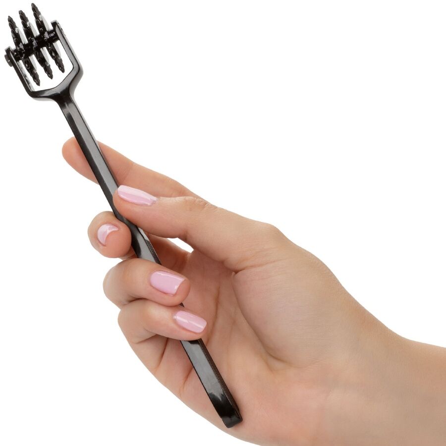 Rullo vibrator CALEXOTICS Scandalo Tripla Ruota del Piacere con tre ruote vibranti e dettagli in silicone nero.