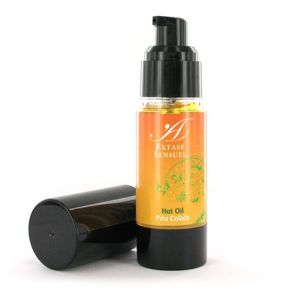 Olio stimolante calore Piña Colada di EXTASE SENSUAL, bottiglia da 30 ml con etichetta colorata e design attraente