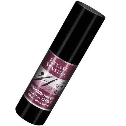 Olio da massaggio EXTASE SENSUAL effetto riscaldante ai feromoni di mora da 30 ml, bottiglia con etichetta e tappo.