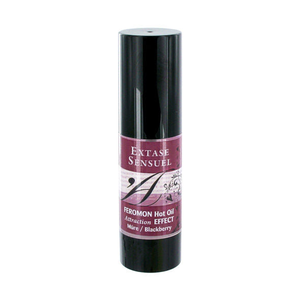 Olio da massaggio riscaldante EXTASE SENSUAL ai feromoni di mora, 30 ml, flacone con etichetta e tappo.