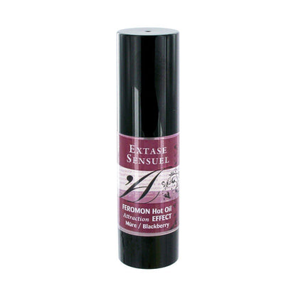 Olio da massaggio riscaldante EXTASE SENSUAL ai feromoni di mora, 30 ml, flacone con etichetta e tappo.