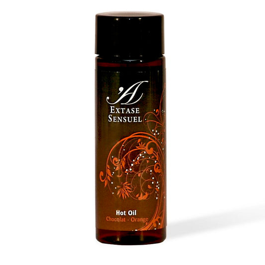 Olio stimolante al cioccolato e arancia di EXTASE SENSUAL, bottiglia da 100 ml, visibile sulla confezione.