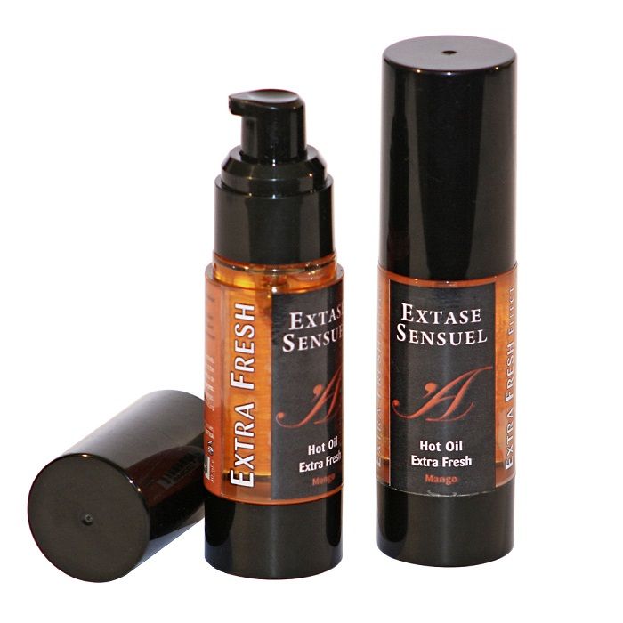 Olio stimolante al mango EXTASE SENSUAL, 30 ml, bottiglia trasparente con etichetta colorata e tappo nero.