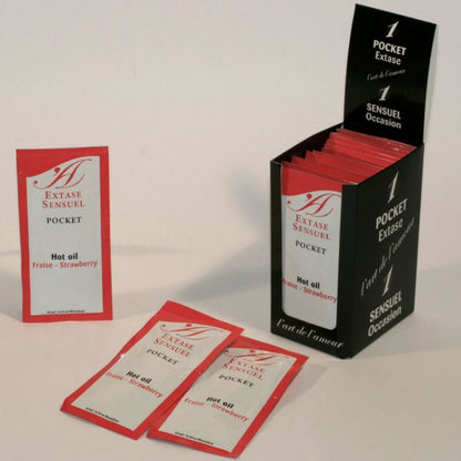 Olio stimolante alla fragola EXTASE SENSUAL, flacone da 10 ml con etichetta colorata e dettagli del prodotto.