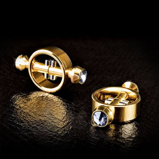 Morsetti magnetici FETISH FANTASY GOLD, set di ferretti metallici per giochi BDSM, in evidenza su sfondo neutro.