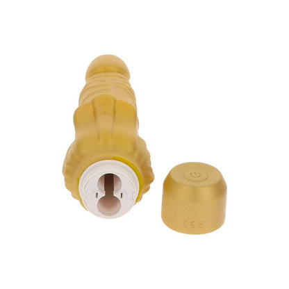 Vibratore gold Dicker Stim di GET REAL, con design elegante e dettagli dorati, visibile nell'immagine.