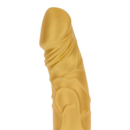 Vibratore originale GET REAL Gold Dicker Oro con dettagli realistici e finitura dorata, visibile in primo piano nell'immagine.