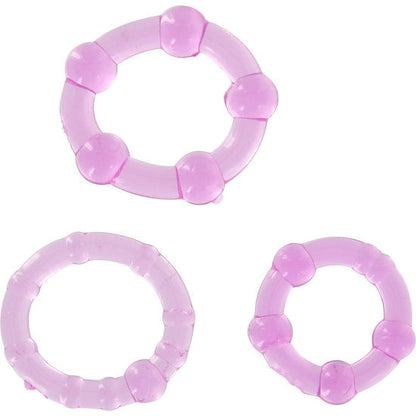 Anelli per pene SEVEN CREATIONS, set di tre anelli lilla in silicone con dettagli decorativi, visibili in primo piano.