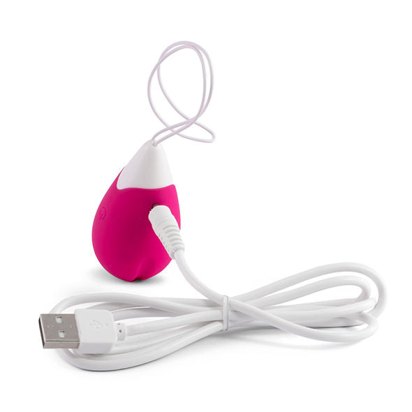 Telecomando vibratore Jan Egg rosa di INTENSE COUPLES TOYS, dispositivo di controllo per giochi intimi, visibile in primo piano.