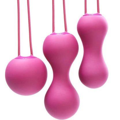 Palle Kegel fucsia della marca JE JOUE, design compatto e colorato, per esercizi di rafforzamento pelvico femminile.