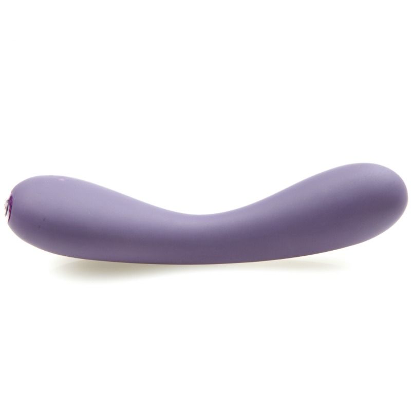 Vibratore viola JE JOUE UMA, design elegante e ergonomico, visibile con dettagli lisci e forma curvata per stimolazione.