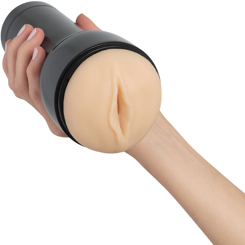 Stroker generico KIIROO Sentire pallido, manico e dettagli realistici, usato per stimolazione personale.