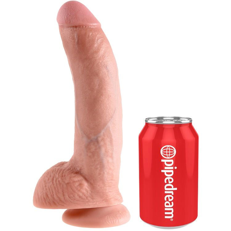 Dildo King Cock in colore flesh con sfere, lunghezza 22,9 cm, mostrato in primo piano.