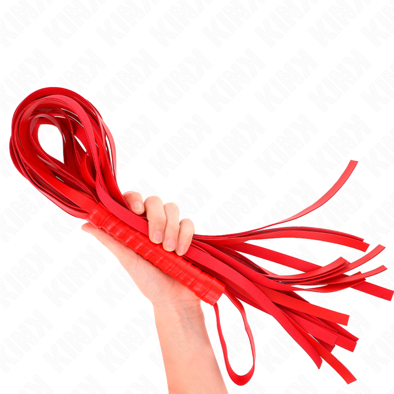Frusta rossa KINK Impact & Touch con manico corto e coda lunga di 70 cm, visibile con dettagli della superficie in pelle.