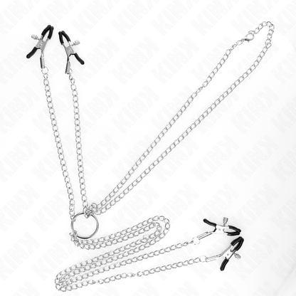 Morsetti regolabili per capezzoli e clitoride KINK NIPPLE GRIP in argento, con dettagli e finiture metalliche visibili nell'immagine.
