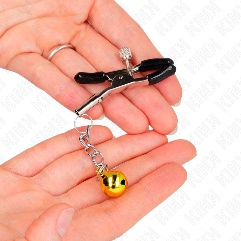 Morsetti per capezzoli KINK con pendente Jingle Bell oro, 6 cm, in stile fetish con dettagli decorativi scintillanti.