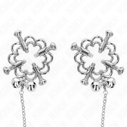 Pinze per capezzoli a fiore in metallo KINK NIPPLE GRIP con catena, accessorio per BDSM, dettagli metallici e design a fiore.
