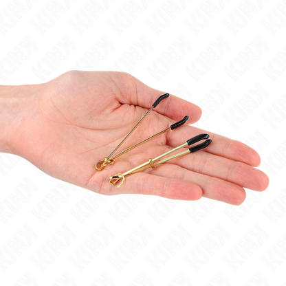 Pinze per capezzoli sottili KINK in oro, lunghezza 7 cm, con design elegante e dettagli raffinati.