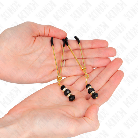 Pinze per capezzoli KINK NIPPLE GRIP oro con tre perline di vetro nere, lunghezza 7 cm, per stimolazione e decorazione.