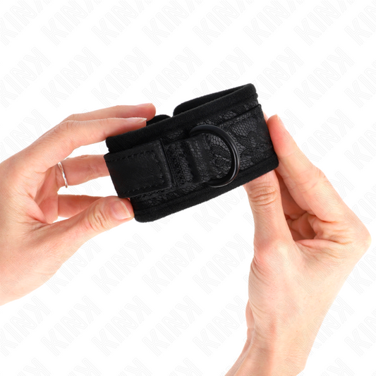 Polsi ricoperti di pizzo scuro in neoprene nero, regolabili, da 20 a 29 cm con lunghezza di 5 cm, prodotto KINK WRIST RESTRAINT