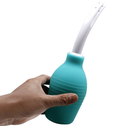 Doccia anale in gomma blu MR PLAY con forma a pera, visibile nell'immagine, ideale per uso intimo e comfort.