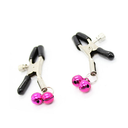 Morsetti per capezzoli OHMAMA FETISH con campanella rosa, dettagli in tessuto morbido e decorativo, ideale per giochi sensoriali.