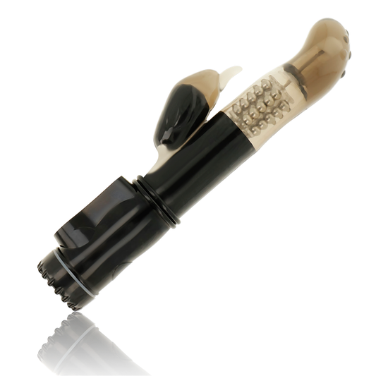 Vibratore rotatore OHMAMA con stimolatore del clitoride a forma di delfino, design elegante e funzionale, in colore rosa.