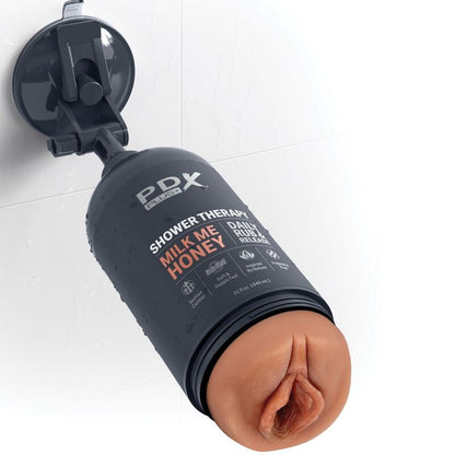 Masturbatore stroker discreto PDX PLUS+ ispirato a bottiglia Milk Me Honey Candy, design compatto e realistico per piacere.