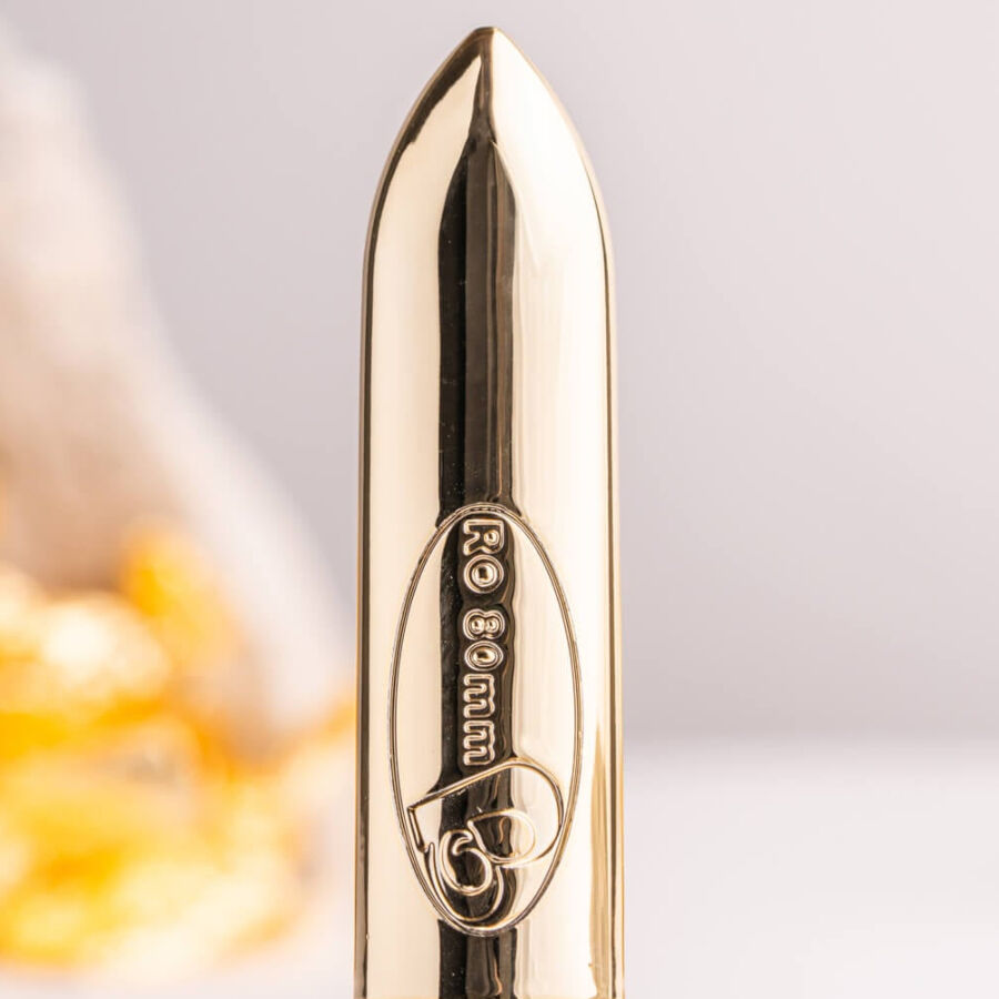 Proiettile vibrante ROCKS-OFF RO-80 Champagne Golden, dispositivo stimolante di alta qualità, con design elegante e superficie dorata brillante.