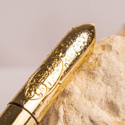 Proiettile vibrante ROCKS-OFF RO-80 Champagne Golden, dispositivo di stimolazione, con design elegante e superficie dorata.