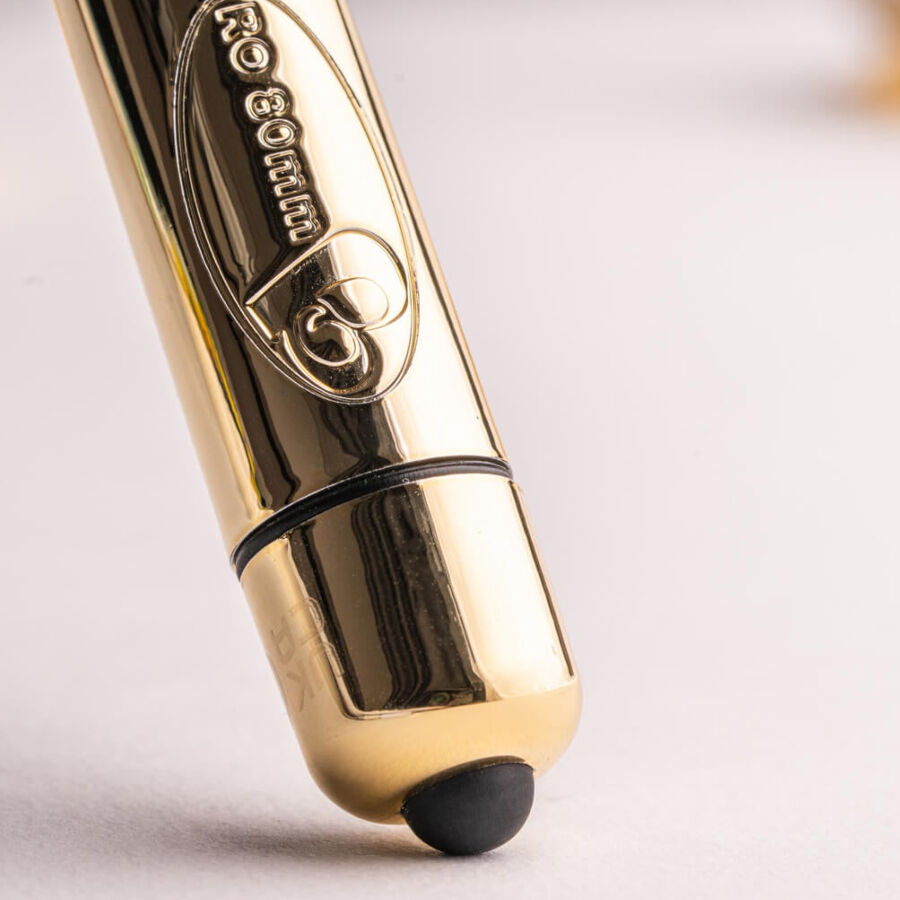 Proiettile vibrante ROCKS-OFF RO-80 Champagne Golden, design compatto e color oro, stimolatore di piacere per adulti.