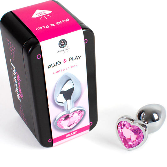 Tappo in metallo fucsia con cuore di SECRETPLAY TOYS, taglia piccola di circa 7 cm, superficie liscia e brillante.