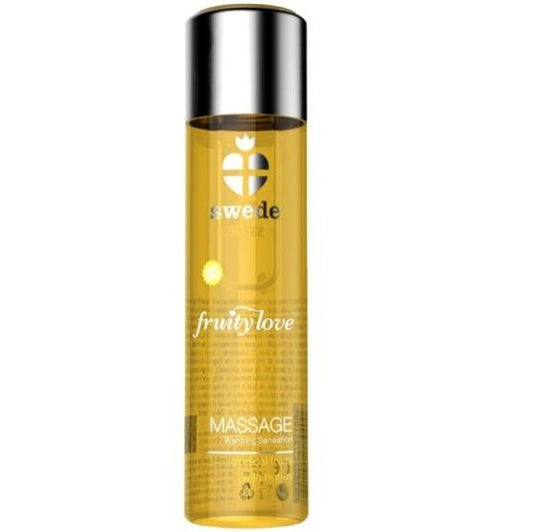 Olio da massaggio SWEDE Fruity Love con effetto riscaldante, fragranza tropicale e miele, 60 ml, bottiglia con etichetta colorata