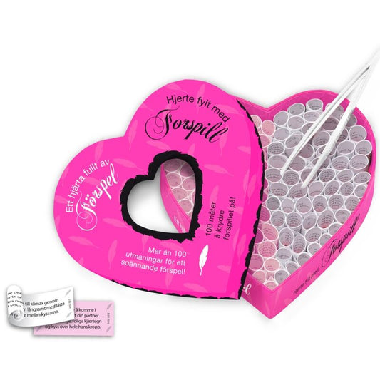 Cuore pieno di preliminari TEASE & PLEASE, prodotto per aumentare il piacere e l'intimità, con confezione elegante e attraente.