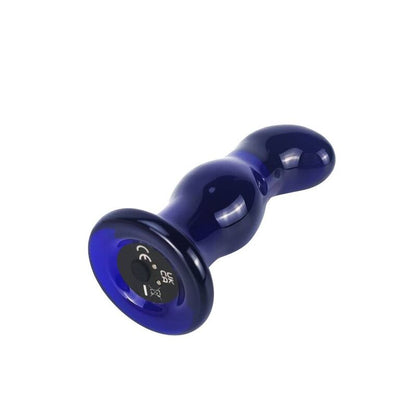 Butt plug in vetro vibrante TOYJOY, design elegante e colorato, con superficie lucida e trasparente, ideale per uso intimo.