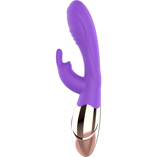 Vibratore Viora ricaricabile in silicone WOMANVIBE, design ergonomico e superficie liscia, ideale per il piacere personale.